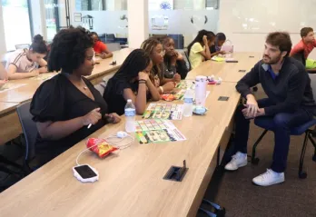Luke with teens at Financial Literacy Workshop