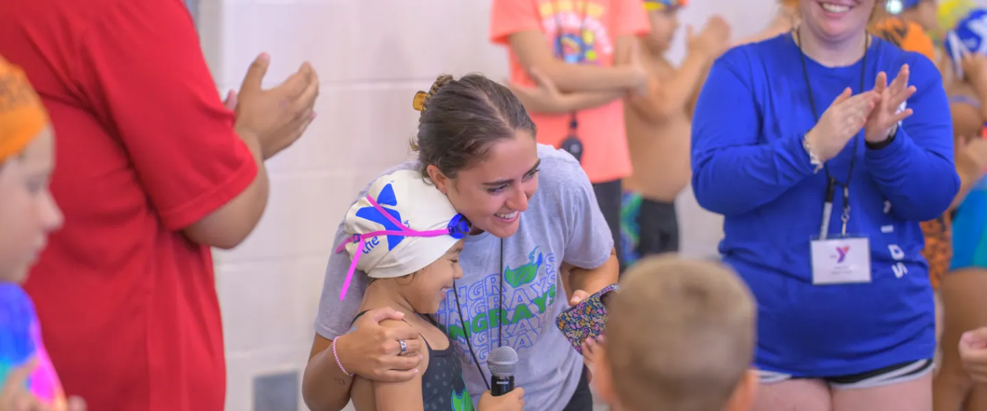 swim team meet small girl smiling