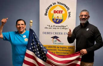 Juanita Estrada and Daniel Edwards at the Grand Prairie Family YMCA, representing DCET and La Escuelita’s adult literacy program