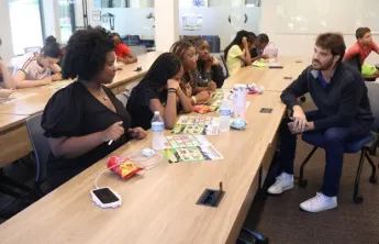 Luke with teens at Financial Literacy Workshop
