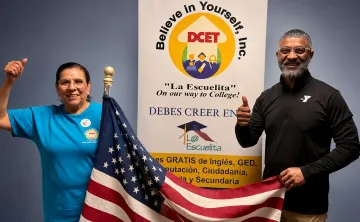 Juanita Estrada and Daniel Edwards at the Grand Prairie Family YMCA, representing DCET and La Escuelita’s adult literacy program